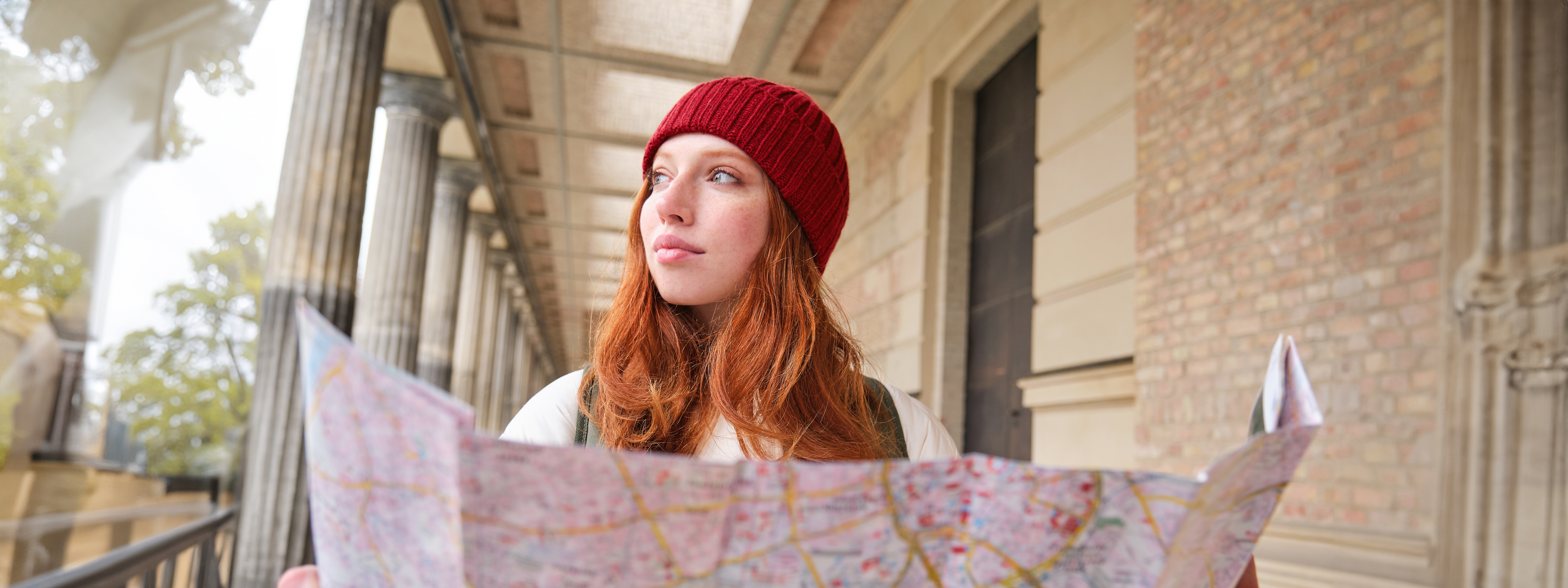 Student exploring her path with a map